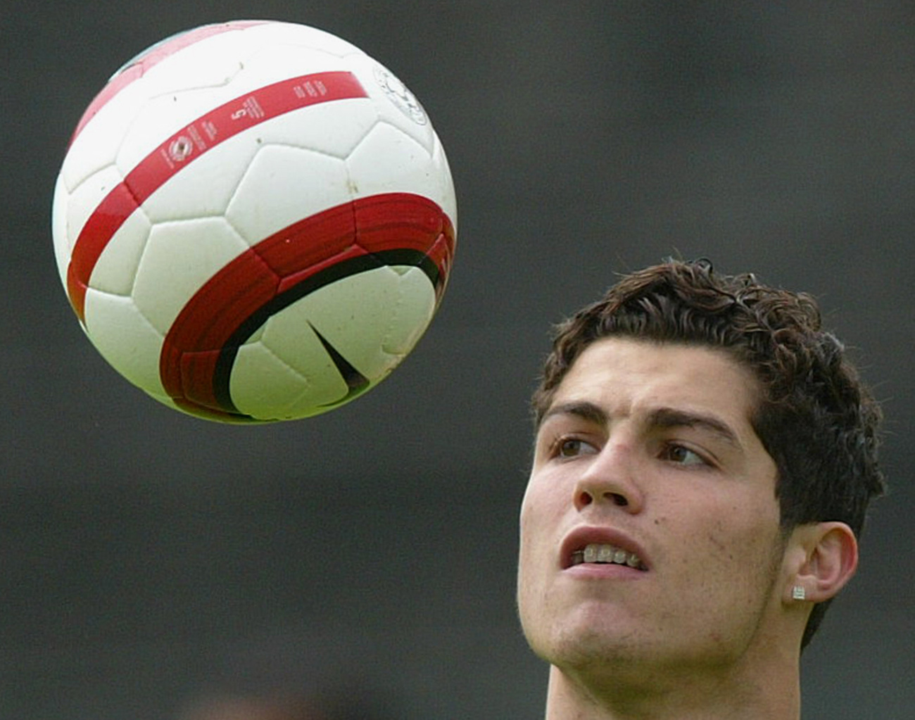 This picture taken on March 6, 2010 shows Real Madrid's Portuguese forward Cristiano Ronaldo reacting during a Spanish league football match against Sevilla at the Santiago Bernabeu Stadium, in Madrid. After a nervous begining the right winger has quickly adapted to the squad set up by the Chilien coach Manuel Pellegrini.