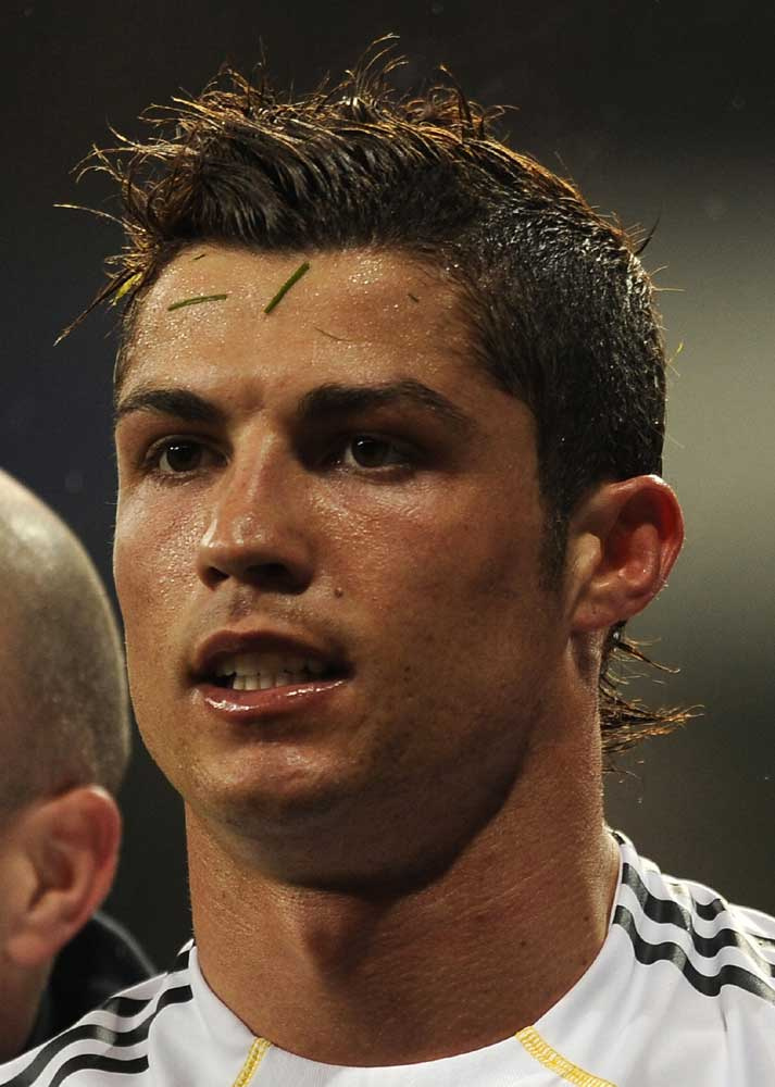 This picture taken on March 6, 2010 shows Real Madrid's Portuguese forward Cristiano Ronaldo reacting during a Spanish league football match against Sevilla at the Santiago Bernabeu Stadium, in Madrid. After a nervous begining the right winger has quickly adapted to the squad set up by the Chilien coach Manuel Pellegrini.