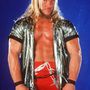 Ő Chris Jericho. Ez a fotó 2000-ben készült róla, és akkor most tekerjünk előre 15 évet...